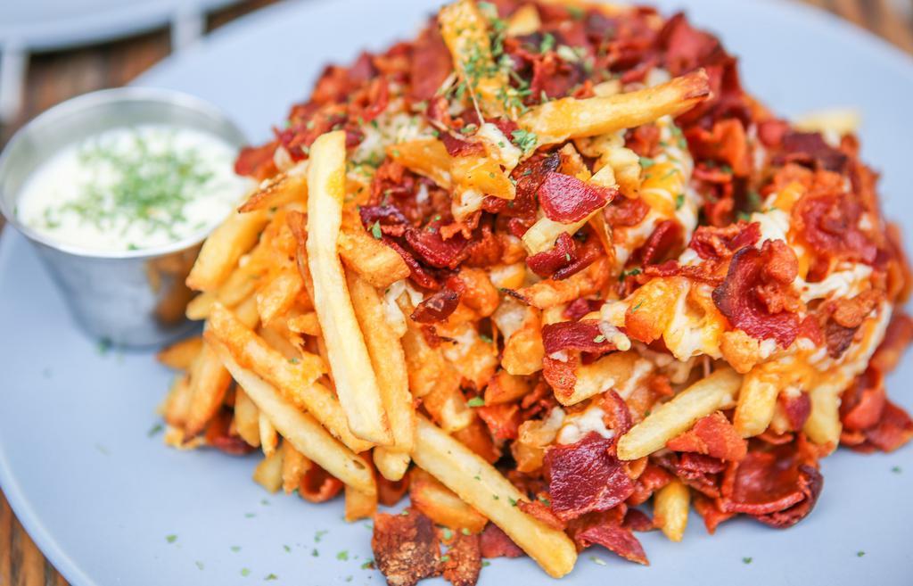 Fully Loaded Fries (16 Oz) · Sixteen ounces fries, sharp cheddar, Parmesan cheese, bacon , side of beurre Blanc sauce.
