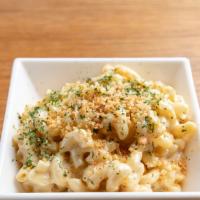 Mac & Cheese · Emmental, Swiss and cheddar based cheese topped with bread crumbs.