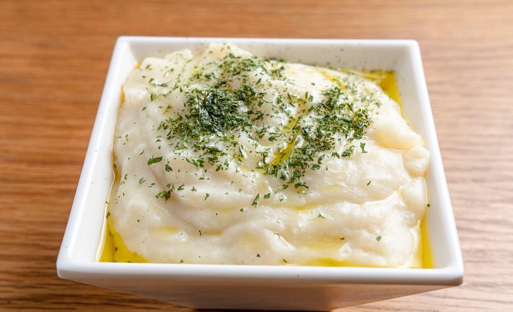 Mashed Potatoes · Idaho housemade mashed potatoes, whole milk, butter salt, white pepper!.