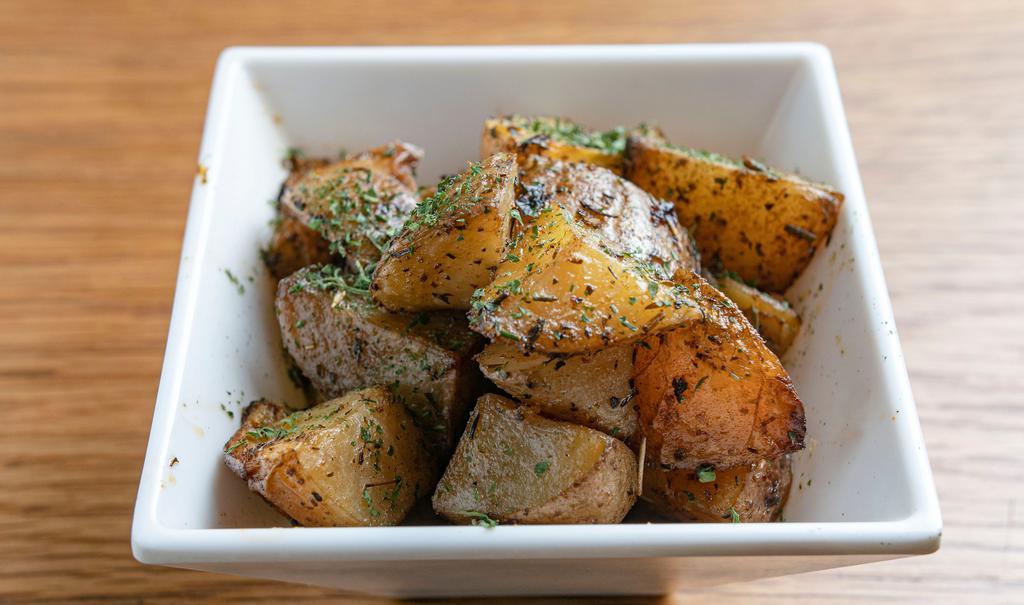 Yukon Gold Roasted Potatoes · Yukon gold roasted potatoes seasoned with herb de provence. Extra virgin oil.