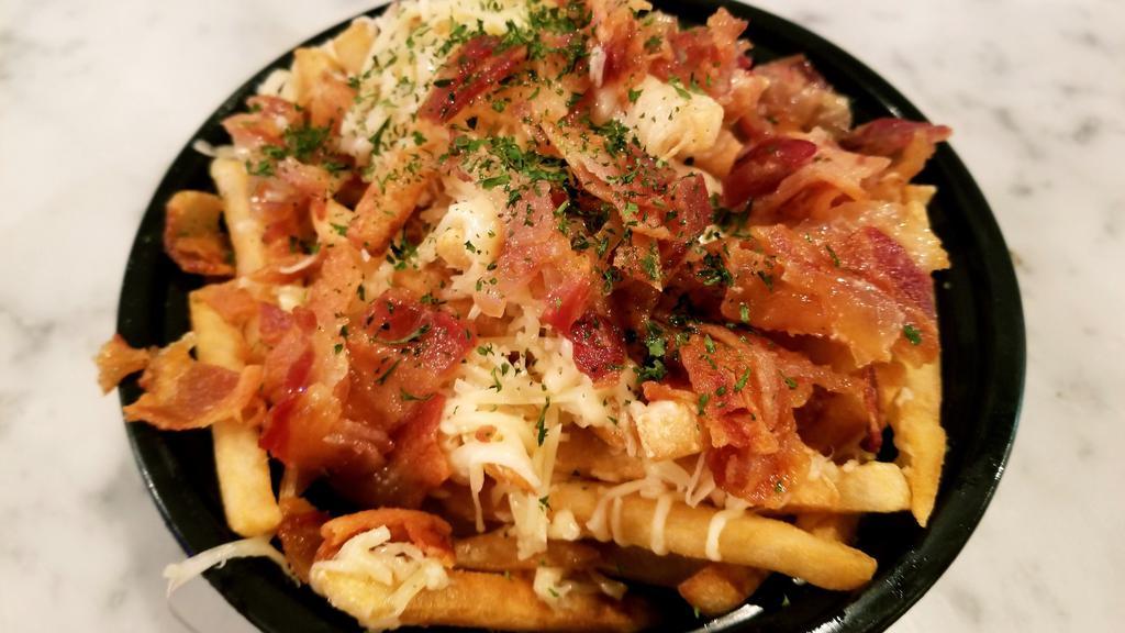 Fully Loaded Fries (Side) · 16 oz. fries, sharp cheddar, parmesan cheese, bacon and side of beurre blanc sauce.