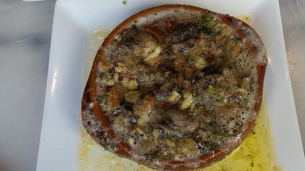 Escargot Snails · With herb garlic butter and cognac.