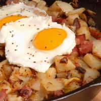 Two Eggs Any Style With Corn Beef Hash · Two eggs served with Corn beef Hash, home fries, and choice of toast.