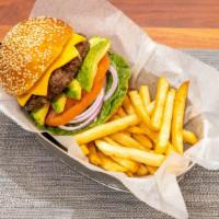 California Burger · Includes Guacamole, American cheese, lettuce, tomato, onions on brioche bun with French frie...