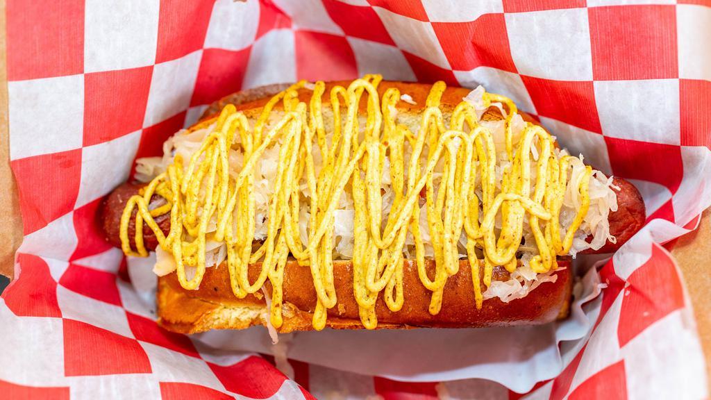 New Yorker · Bacon wrapped hot dog, sauerkraut, spicy brown mustard.