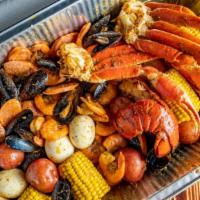 Feast Platter · 1lb snow crab, 1lb headless shrimp, 1lb black mussel, 1lb blue crab, 1lb crawfish &1 lb saus...