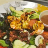 California Salad · (Shrimp, avocado, bacon, cucumber, tomato, olives and boiled eggs).