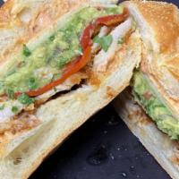 The Rooster · Chicken breast thinly sliced, roasted red peppers, mozzarella, spicy mayo, and guacamole.