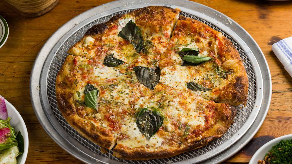 Pizza Margherita  · Ancient grain dough, mozzarella, tomatoes, spring onions and fresh basil.