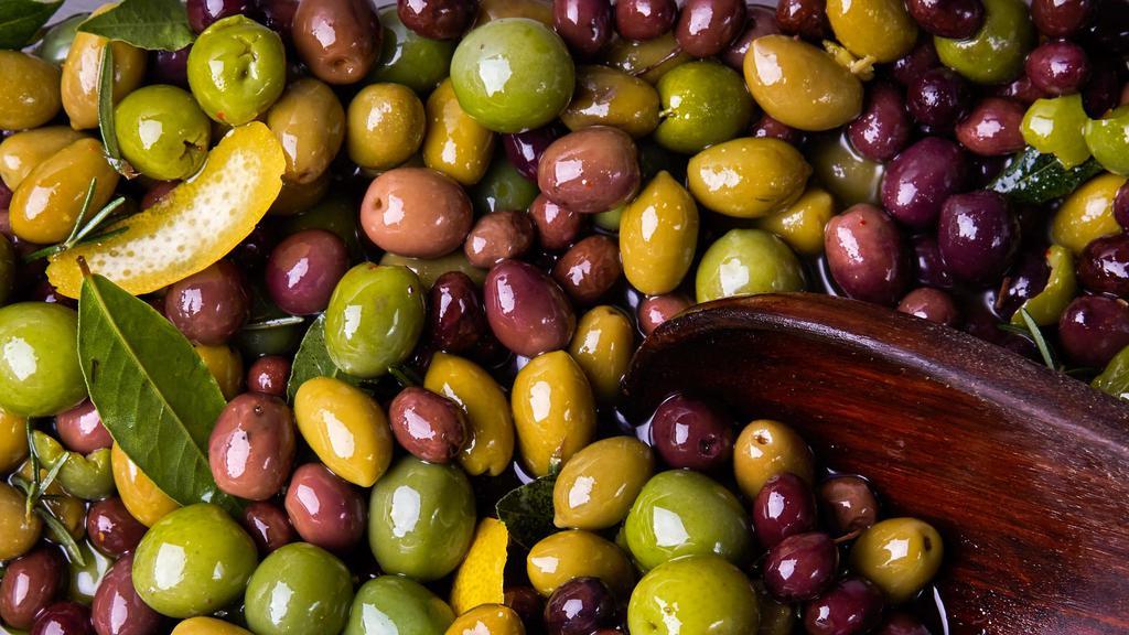 Marinated Mixed Olives · Castelvetrano olive, nicoise olive, picholine olive, gaeta olive, lemon juice, orange juice, rosemary, fennel pollen 1 pint.