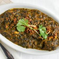 Saag Paneer · Spinach and homemade cheese with a little curry sauce.