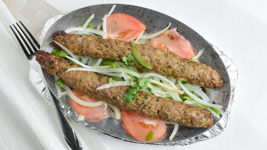 Seikh Kebab · Minced lamb meat blended with special spices and herbs.