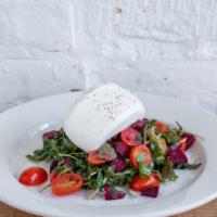 Fresh Burrata · Served with arugula, beets, red and yellow cherry tomatoes, topped with balsamic vinaigrette...