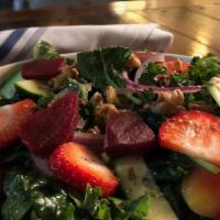 Summer Salad · Mixed salad greens, strawberries, goat cheese & pecans served with creamy balsamic dressing.
