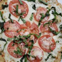 Napolitano Pizza Personal · Fresh mozzarella base, fresh tomato, basil, and olive oil.
