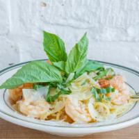 Shrimp Scampi · A blend of shrimp, spaghetti, onion, roasted garlic, and a touch of cilantro, parmigiano.