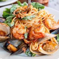 Pasta Pescatore · Clams, mussels, shrimp, and calamari with your choice of homemade marinara or alfredo sauce,...