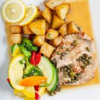 Veal Picatta · Served with capers in a lemon and white wine sauce. Served with daily vegetables and roasted...