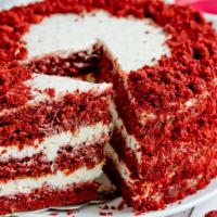 Red Velvet Cake · Rich Red Velvet Cake Slice Topped with Cream Cheese Frosting.