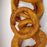 Onion Rings · Enjoy these beer battered Onion Rings deep fried to perfection.