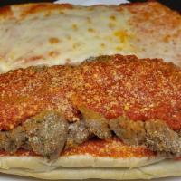 Meatball Sub - Large · Our homemade meatballs sliced and stacked on a sub roll. Layered with marinara sauce and gra...