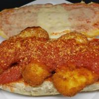 Chicken Parm Sub - Large · Our Chicken Parm  sub includes mozzarella, grated cheese and our signature marinara sauce. L...