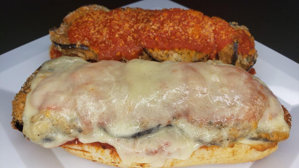 Eggplant Parm Sub - Large · Our Eggplant Parm  sub includes mozzarella, grated cheese and our signature marinara sauce. Large is 12