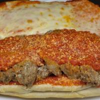 Meatball Sub - Small · Our homemade meatballs sliced and stacked on a sub roll. Layered with marinara sauce and gra...