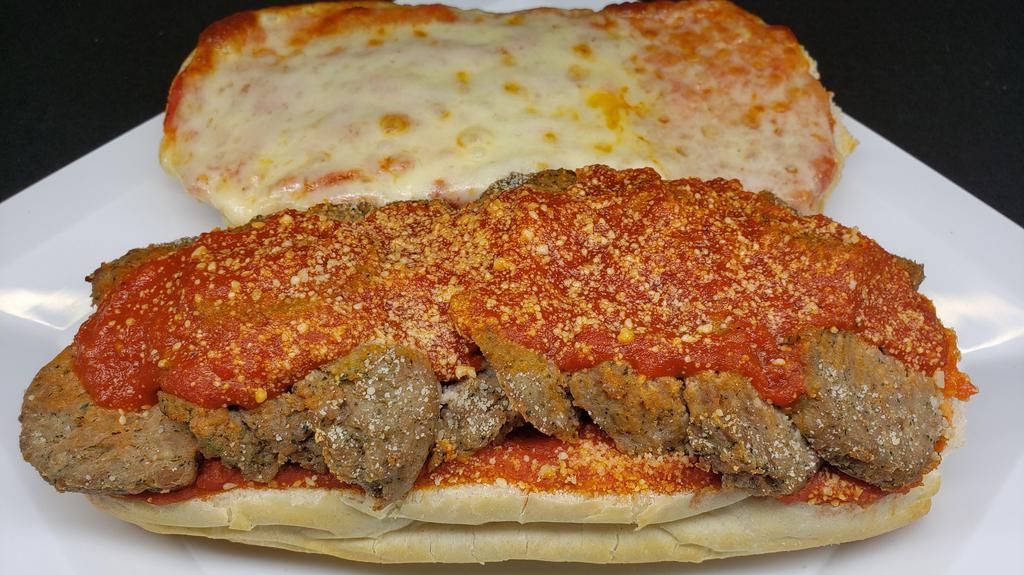 Meatball Sub - Small · Our homemade meatballs sliced and stacked on a sub roll. Layered with marinara sauce and grated cheese. Small is 6