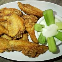 10 Wings · Choice of hot or mild sauce, traditional or boneless, blue cheese dressing is included.