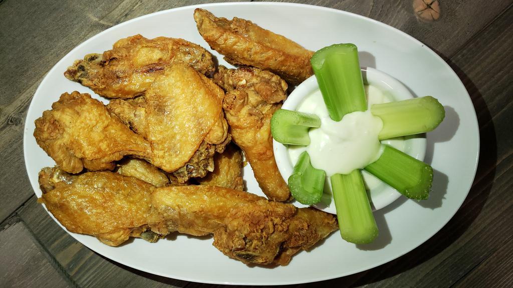 10 Wings · Choice of hot or mild sauce, traditional or boneless, blue cheese dressing is included.