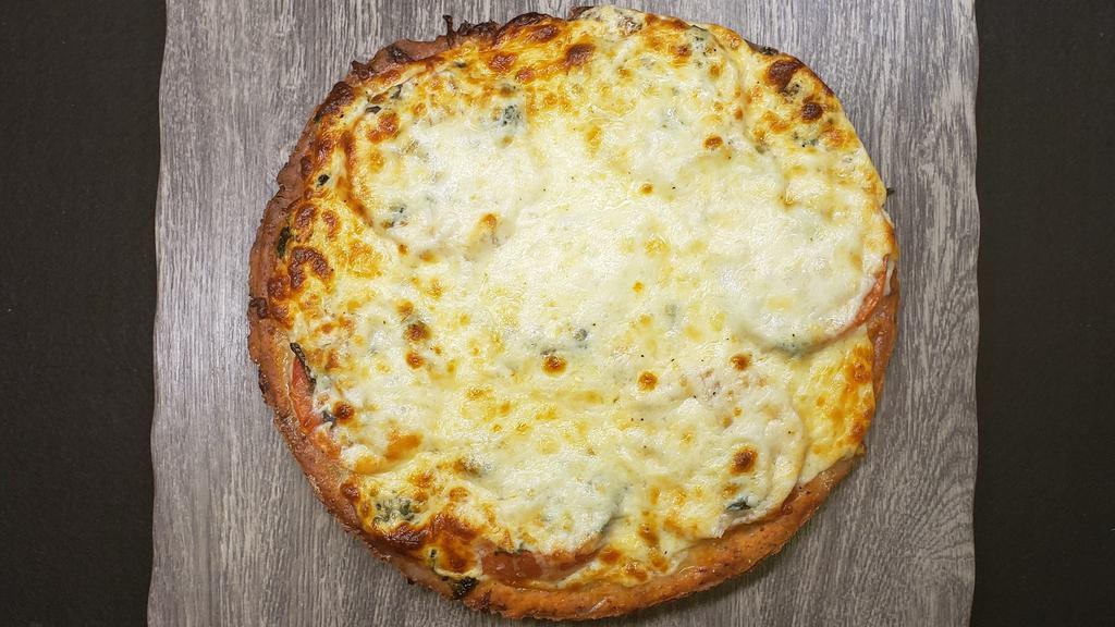 Cauliflower Crust Margherita Pizza (8 Pieces) · A classic 10