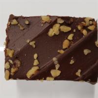 Brownies · A tasty brownie coated in a chocolate frosting and sprinkled with walnuts.