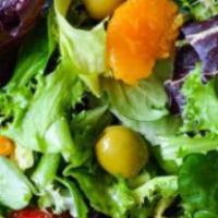 Mixed Green Salad · Romaine lettuce, baby arugula, scallions and halloumi cheese with lemon vinaigrette.