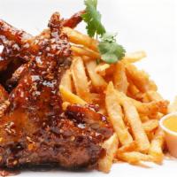 Sticky Wings (3Pcs) + Fries · 3PCS Jumbo whole wings tossed in our homemade sticky sauce, served with a side of fries & sp...