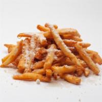 Truffle Parm Fries · Crispy crunchy fries tossed in black truffle oil  served with a side of Spicy mayo