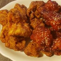 Yangyeom Chicken (양념치킨) · Fried chicken with Korean garlicky sweet & spicy sauce.