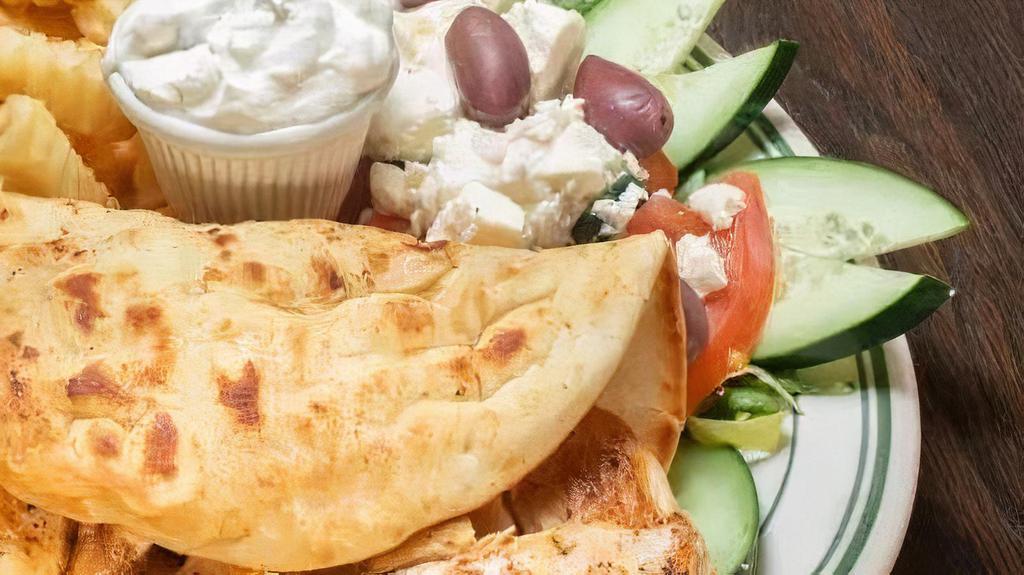 Grilled Chicken Gyro · Served on pita bread. With lettuce, tomato and tzatziki sauce.