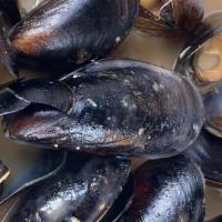 Red Curry Mussels · PEI mussels, red curry + coconut broth, cilantro. crostini 
Gluten Free available