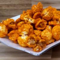 84 Oz Gourmet Cheddar Caramel Popcorn · Gourmet popcorn never tasted so good!  Caramel base popcorn, topped with premium cheddar che...