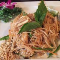 Pad Thai · Gluten-free. Stir-fried mixture rice noodle, egg, bacon sprout, lime & green onion, in pad T...