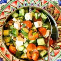 Chopped Salad  · cucumber, tomato, olives, red onion, feta, chickpea carrot sherry vinaigrette