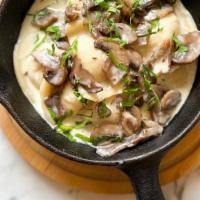 Potato Vareniki (Dumplings) · cream of mushroom sauce