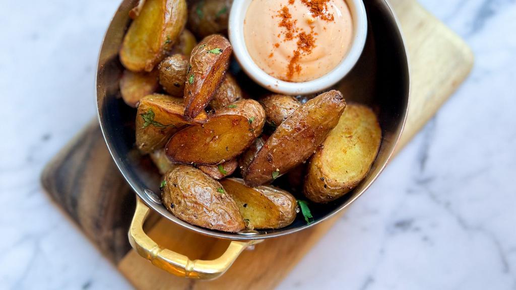 Patatas Bravas · fingerling potatoes, chipotle aioli