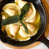 Beef & Pork Vareniki (Dumplings) · butter and sage sauce