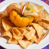 Mi Sabor Pepper Poppers · 2 Shrimp with guacamole stuffed inside a pepper. Accompanied by chips.
