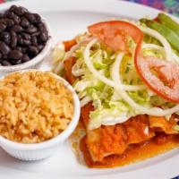 Enchiladas · Soft Folded Tortillas with your choice of Meat and Sauce. Topped with Sour Cream, Lettuce, T...
