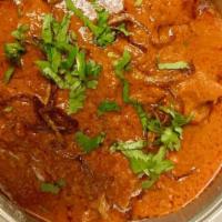 Chicken Vindaloo · Chicken cooked with hot, spicy vinegar mixed sauce and potatoes.