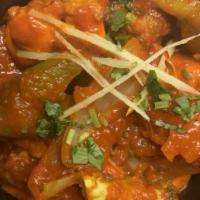 Chicken Jalfrezi · Stir-fried chicken and vegetables cooked in sweet and sour sauce.