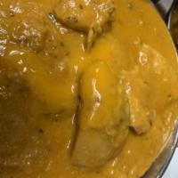 Chicken Morongo  · Boneless chicken cooked with exotic Indian spices and creamy mango sauce.